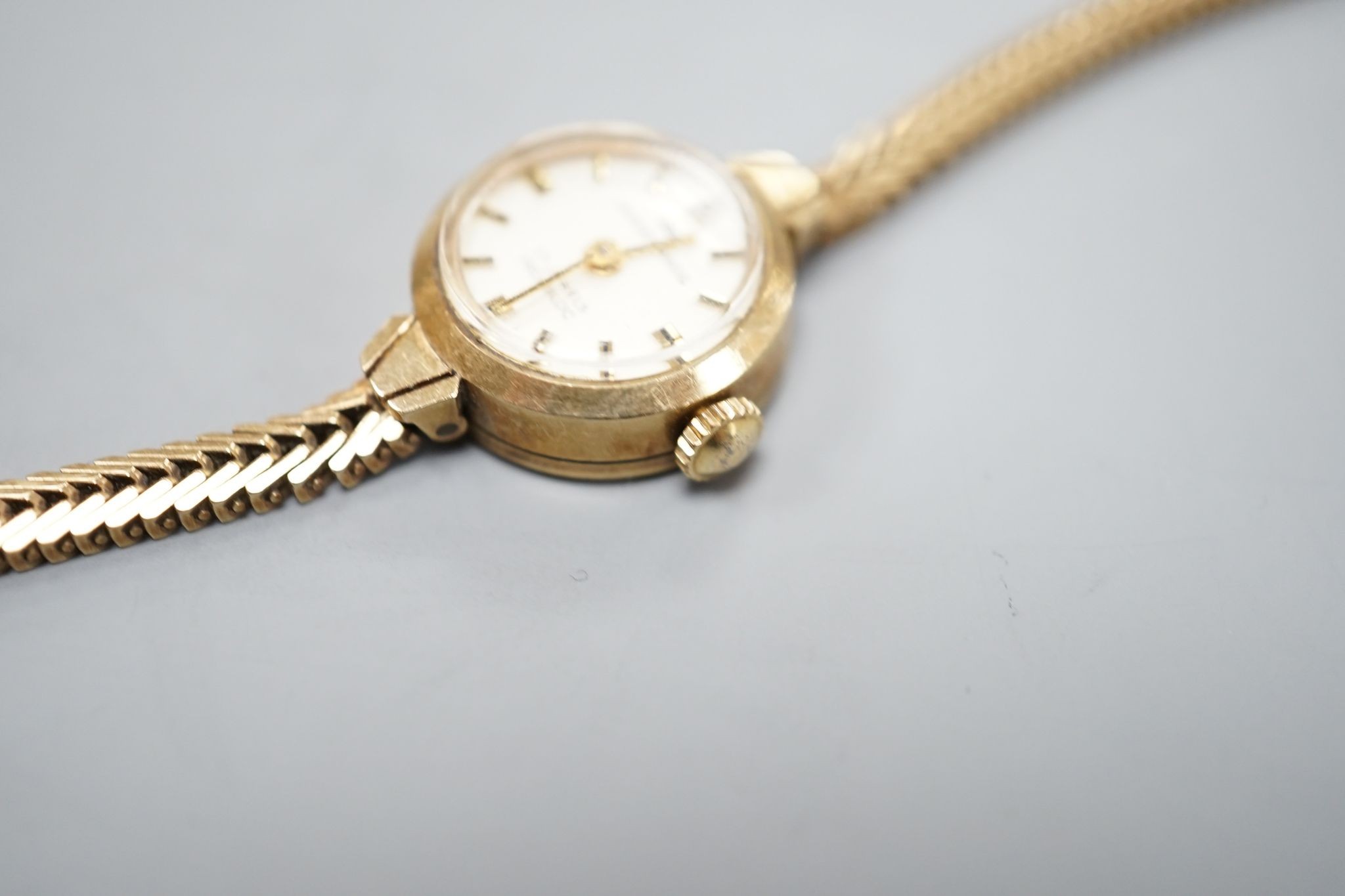 A lady's Jaquet Droz 9ct gold manual wind wrist watch